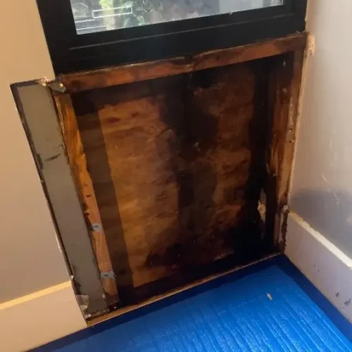 Water damaged timber furniture needing professional restoration